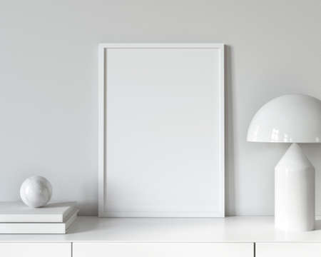 White interior with a Poster mockup on the chest of drawers near the mid-century modern lamp, books and a marble ball / 3D illustration, 3d renderの写真素材