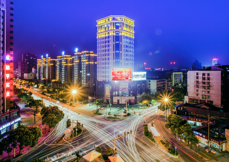 Light rail at the night view of urban intersectionのeditorial素材