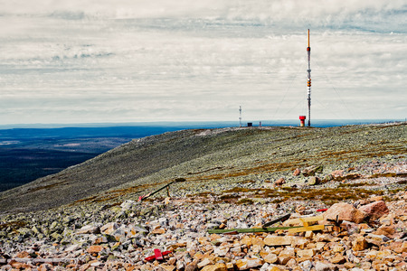 A futuristic looking telecommunications tower on top of the Yllas fjell in the Finnish Lapland. The scene looks a bit uninhabitated, but there are a lot of tourists needing high quality telecommunications.の写真素材