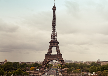 The rain is getting closer to the best known landmark of Paris, the Eiffel Tower.の写真素材