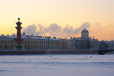 Russia. Saint Petersburg. Winter. Rostral column and curiosities at sunsetの写真素材
