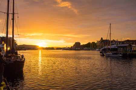 Scenic white night View Famous Bryggen street is a series of Hanseatic commercial buildings lining the eastern side of the harbour in Bergen, Norwayの写真素材