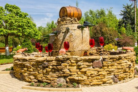 MOLDOVA, MILESTII MICI 2018 - may 2018: wine fountain outside the winery on AUGUST 3, 2012 in Milestii Mici, Moldavia. Milestii Mici has the worlds largest underground wine storage cave network.のeditorial素材