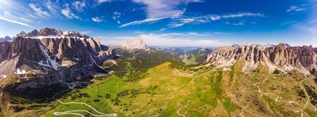 Dolomites - Beautiful panoramic sunset landscape at Gardena Pass, Passo Giau, near Ortisei. Stunning airial view on the top Dolomiti Alps Mountains from drone on summer day, Italy, south Tyrol Europeの写真素材