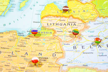 Close-up view of Baltic States on a geographical globe, Map shows capitals countries Latvia -Riga, Lithuania - Vilnus, Estonia -Tallin Poland -Krakow and Kaliningrad region of Russia and their flagsの写真素材