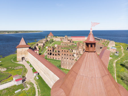 Europe. Russia, Leningrad region, St. Petersburg, Aerial panoramic view on fortress Oreshek near Schlesselburg town. Ancient Russian fort on island in Ladoga lake in sunny summery dayの写真素材