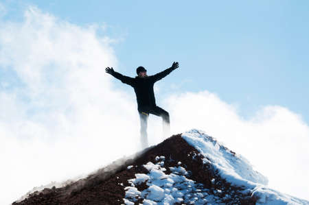 Climber on top of a mountainの写真素材