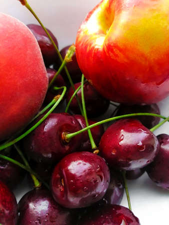 Cherries, peach and nectarine together