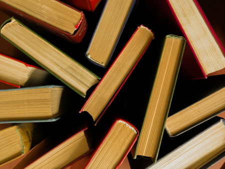 Vintage photo of chaotically arranged booksの写真素材
