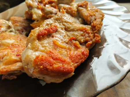 Fried chicken on a black plateの写真素材