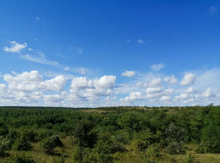 View from the hill to the valley and cloudsの写真素材