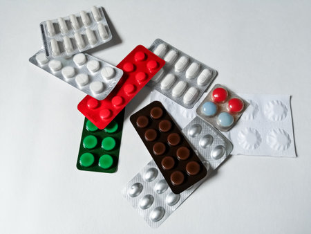 Different packages of tablets on a white backgroundの写真素材