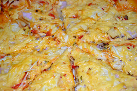 Pizza close-up. Cheese pizza up close. A large, homemade pizza with a bunch of cheese. Hot pizza photo on top.の写真素材