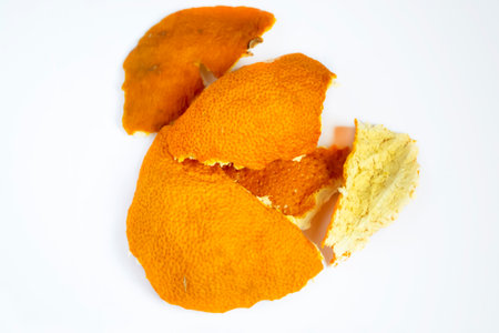 The skin of the tangerine is dried. Dry ingredients for tea and compote - tangerine skin. Lots of dried citrus skin.の写真素材