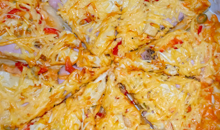 Pizza close-up. Lots of cheese on the pizza. Homemade pizza with a bunch of cheese.の写真素材