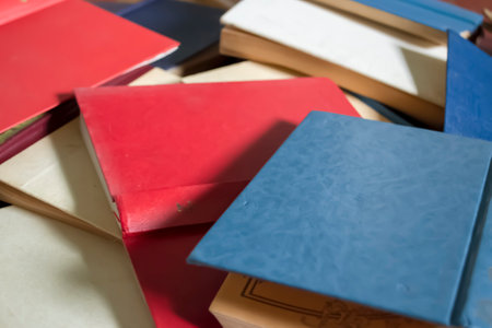 Lots of old books. Old books are in a heap. a dumping ground for books. A lot of old books are...