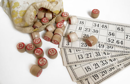 Board game on a white background - barrels and bingo cards. Elements of a lotto game. An old lotto game on a white background.の写真素材