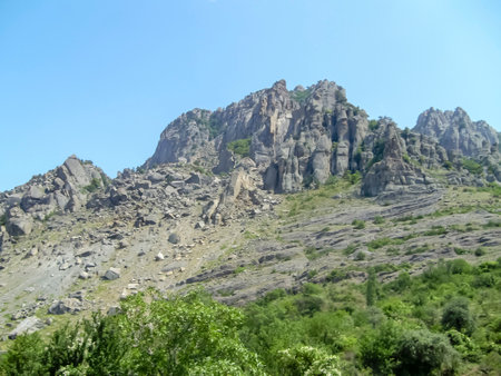 The landscape is mountainous. mountain view. high mountains with green trees and beautiful skies. The beauty of nature in the mountains.の写真素材