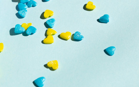Decoration for Easter in the form of hearts. yellow and blue hearts on a blue background. St. Vadlentins Day in Ukraine is a yellow-blue heart.の写真素材