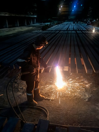 The process of cutting metal with a gas machine. metallurgy. Work at a foundry metallurgical plant....