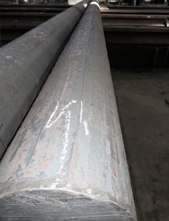 Metal circle for work by workers in the factory. metallurgy. Work at a foundry metallurgical plant. Metal sorting before shipment.の写真素材