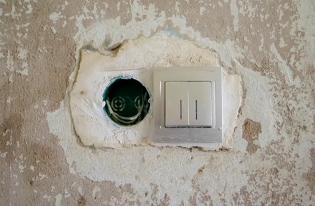Home renovation - new switches. Replacement of light switches in the house.の写真素材
