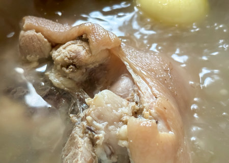 Pork broth from meat and bones Steep broth on pork knuckle.