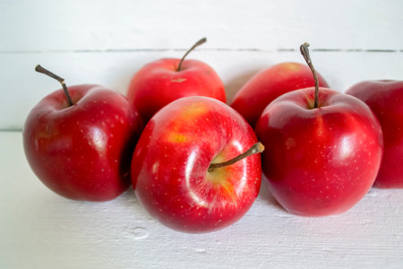Red apples on a light background.の写真素材