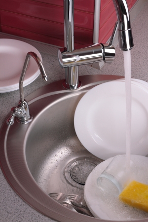 The process of washing dishesの写真素材