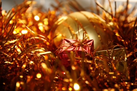 Christmas bulb and gift box decoration in goldの写真素材