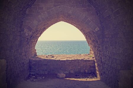 Mediterranean sea from the coast and Apollonia's ruinsの写真素材
