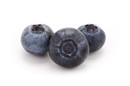 three blueberries on a white backgroundの写真素材