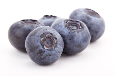 five blueberries on a white backgroundの写真素材