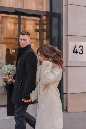beautiful young couple in love walking in the city, romantic date