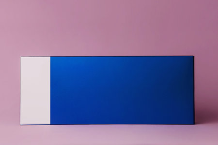Blue box on a pink background. Minimalistic still life.