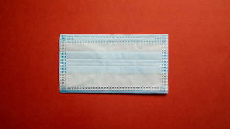 biosafety element white mask accompanied by technological objects on a unicolor backgroundの写真素材