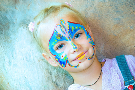Pretty Girl Child with face painting. Make up