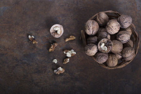Walnuts close-up, walnuts on a dark background.