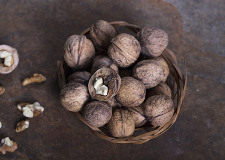 Walnuts close-up, walnuts on a dark background.の写真素材