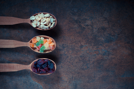 Variety of breakfast cereals and dried fruit.の写真素材