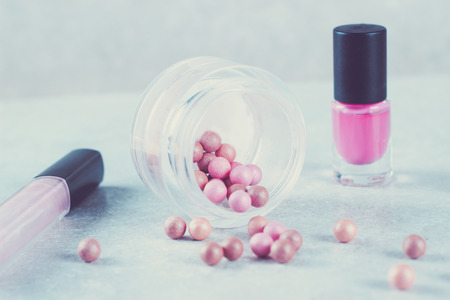 Makeup products on the light white background.の写真素材