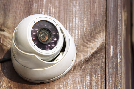 The CCTV security camera operating outdoor.