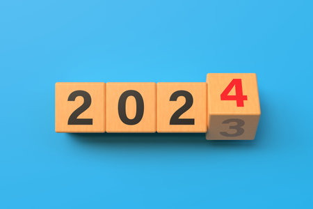 Flipping 2023-2024. numbers on wooden cubes to prepare for New Year's changes and launch of a new...