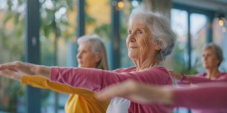 Elderly women doing sports in a nursing home, movement and recreation for the elderlyの素材