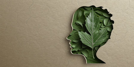 human head with a green leaf, in the style of delicate paper and cardboard cutouts. earth and ecology day conceptの素材
