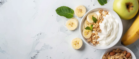Healthy breakfast with natural yogurt, muesli, apple and bananasの素材
