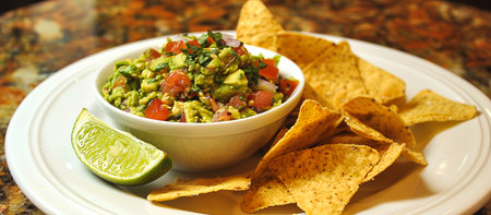 Guacamole: A sauce made from mashed avocado mixed with lime juice, chopped onions, tomatoes, cilantro and seasoned with salt and pepper.の素材