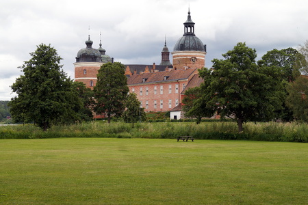 Medieval Gripsholm Castle with trees and the green on a foregroundのeditorial素材