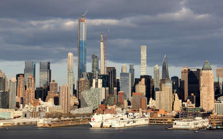 New York City Manhattan midtown skyline panorama over Hudson River.の写真素材