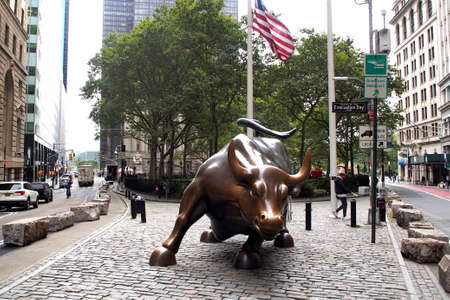 Charging Bull, aka the Wall Street Bull, bronze sculpture on Broadway at Bowling Green, New York, NY, USA - October 13, 2020のeditorial素材